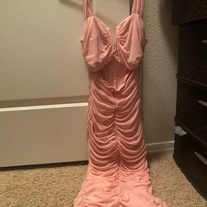 I am selling a pink cute dress size medium